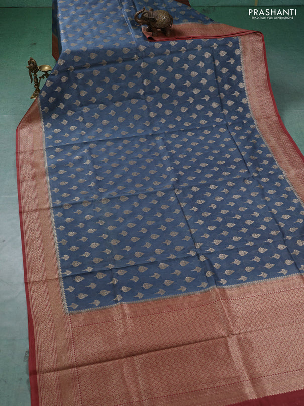 Banarasi silk cotton saree grey and rust shade with allover thread & zari woven buttas and woven border