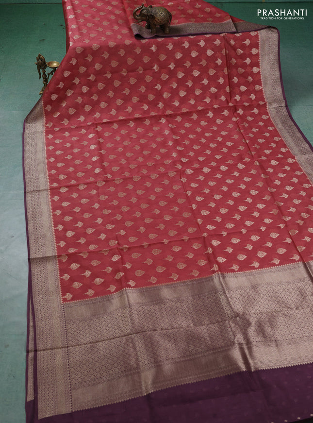 Banarasi silk cotton saree rust shade and purple with allover thread & zari woven buttas and woven border