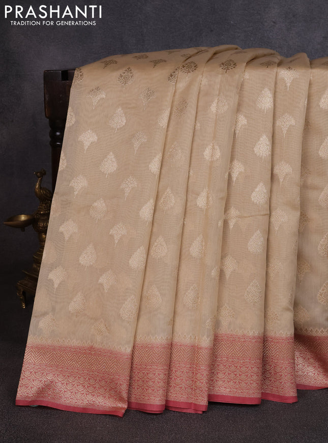 Banarasi silk cotton saree bluish grey and dark peach with allover thread & zari woven buttas and woven border