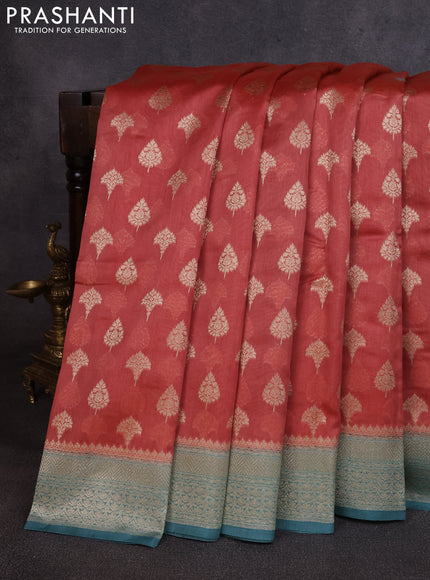 Banarasi silk cotton saree rust shade and pastel blue with allover thread & zari woven buttas and woven border