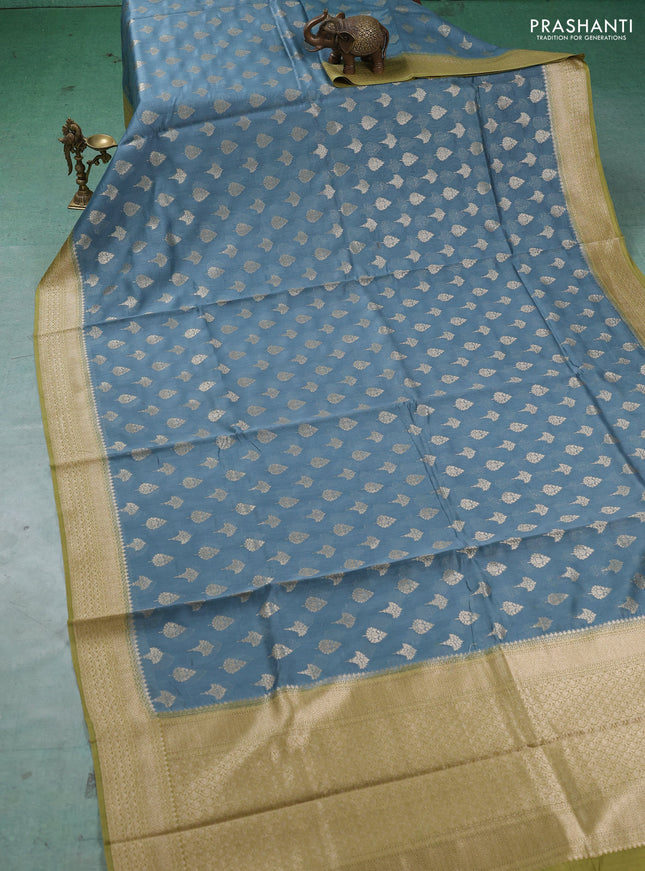 Banarasi silk cotton saree pastel blue and mehendi green with allover thread & zari woven buttas and woven border