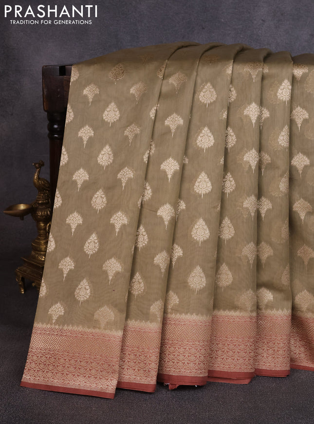 Banarasi silk cotton saree beige and rust shade with allover thread & zari woven buttas and woven border