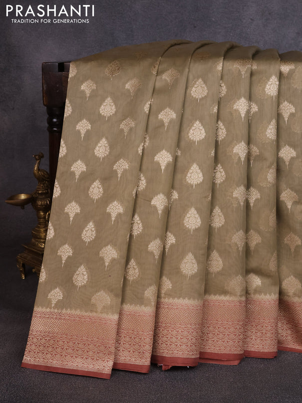 Banarasi silk cotton saree beige and rust shade with allover thread & zari woven buttas and woven border