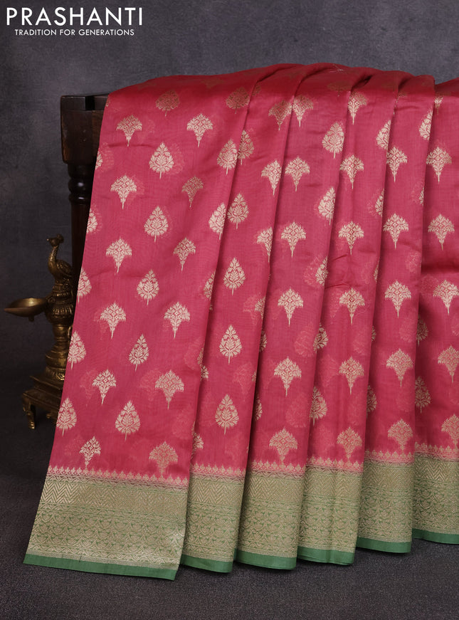 Banarasi silk cotton saree dark peach and green with allover thread & zari woven buttas and woven border