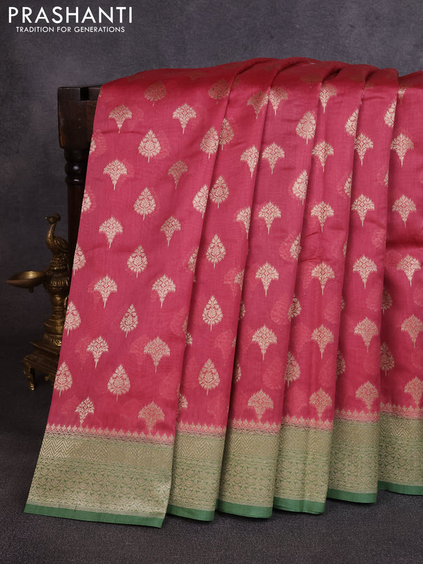 Banarasi silk cotton saree dark peach and green with allover thread & zari woven buttas and woven border