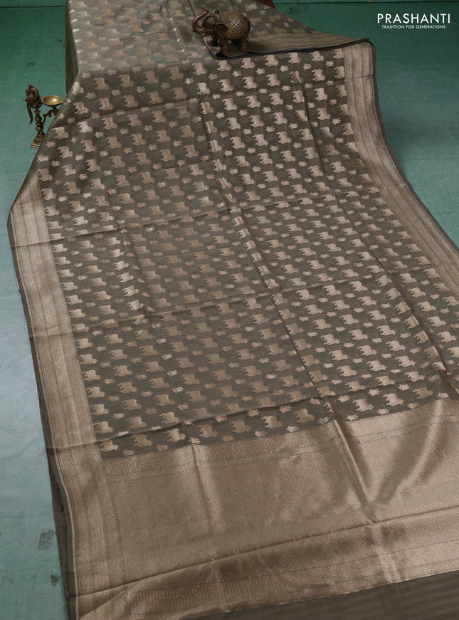 Banarasi silk cotton saree military green with allover thread & zari pichwai buttas and woven border