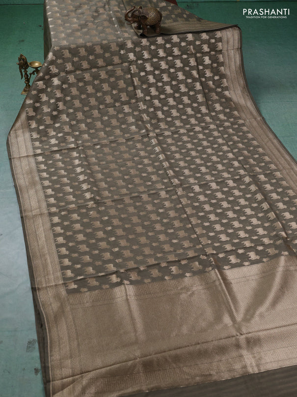 Banarasi silk cotton saree military green with allover thread & zari pichwai buttas and woven border