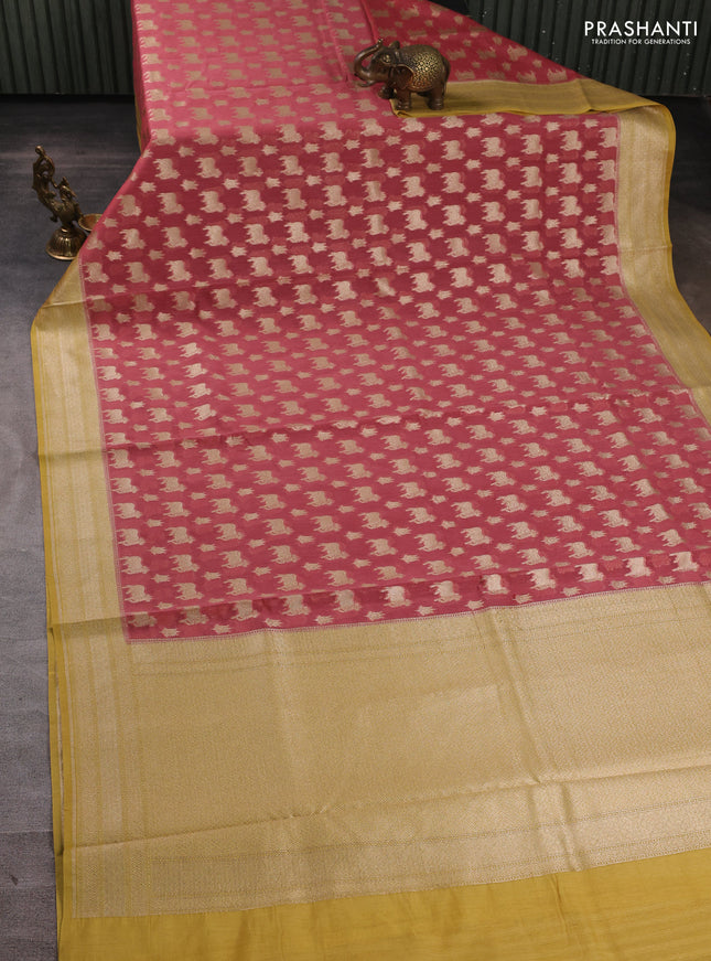 Banarasi silk cotton saree dark peach and mustard yellow with allover thread & zari pichwai buttas and woven border