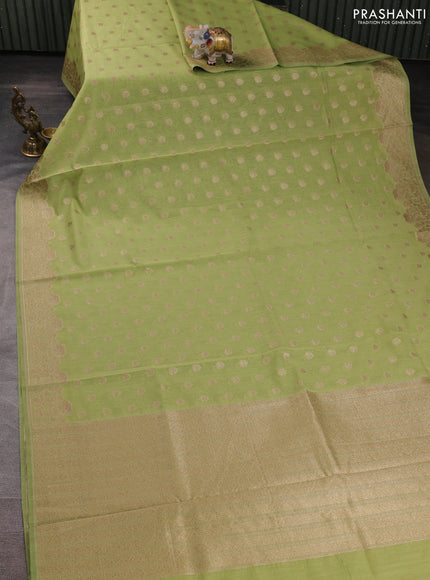 Banarasi silk cotton saree pista green with allover thread & zari woven buttas and woven border