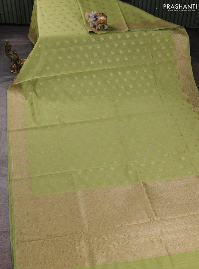 Banarasi silk cotton saree pista green with allover thread & zari woven buttas and woven border