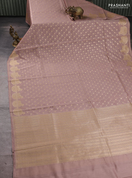 Banarasi silk cotton saree pastel peach with allover thread & zari woven buttas and pichwai woven border