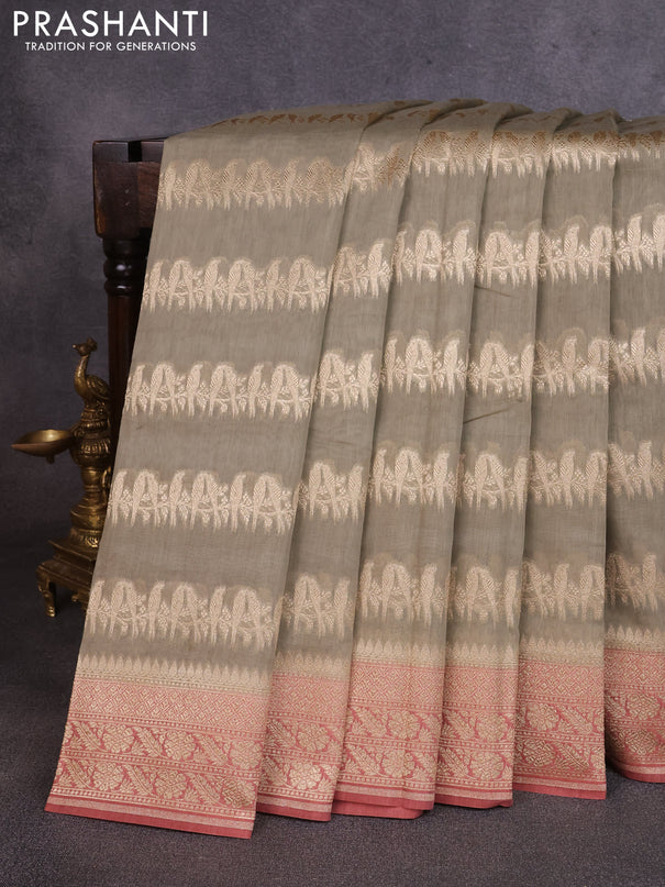Banarasi silk cotton saree pastel green and dark peach with allover thread & zari weaves and woven border