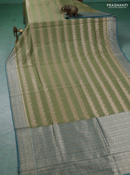 Banarasi silk cotton saree pastel green and pastel blue with allover thread & zari weaves and woven border