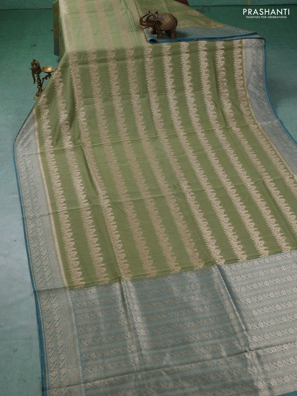 Banarasi silk cotton saree pastel green and pastel blue with allover thread & zari weaves and woven border