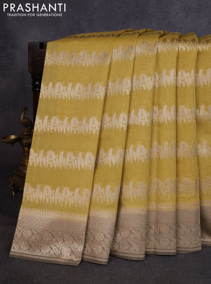 Banarasi silk cotton saree mustard yellow and military green with allover thread & zari weaves and woven border