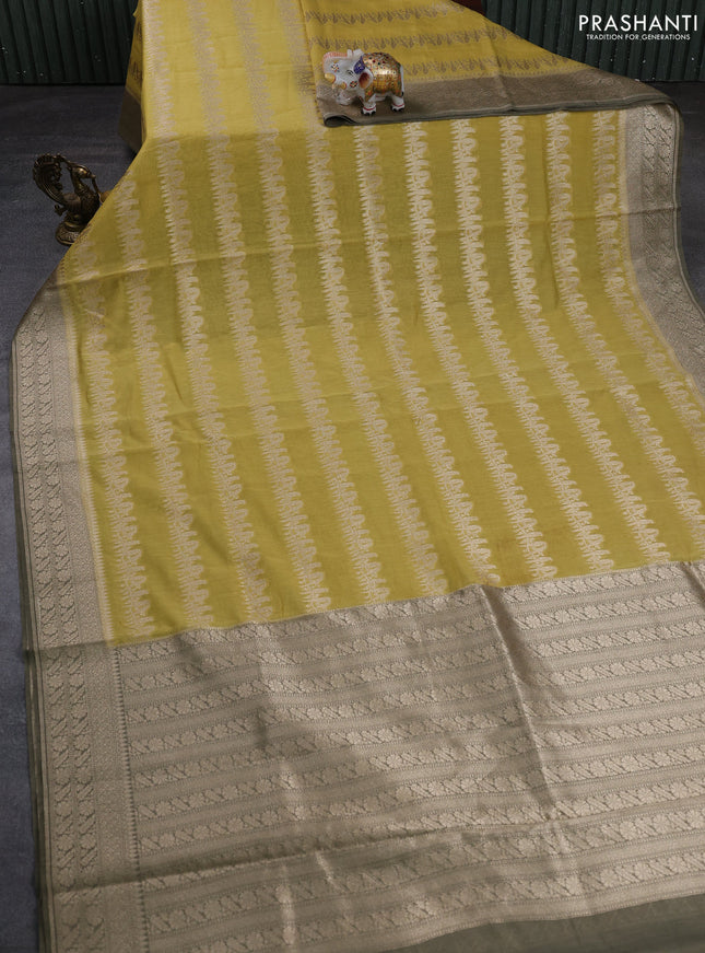 Banarasi silk cotton saree mustard yellow and military green with allover thread & zari weaves and woven border