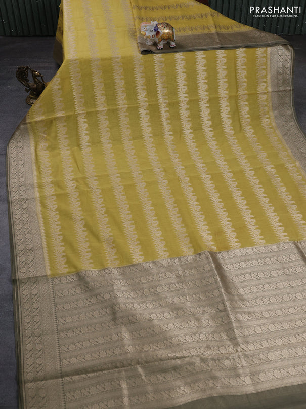 Banarasi silk cotton saree mustard yellow and military green with allover thread & zari weaves and woven border