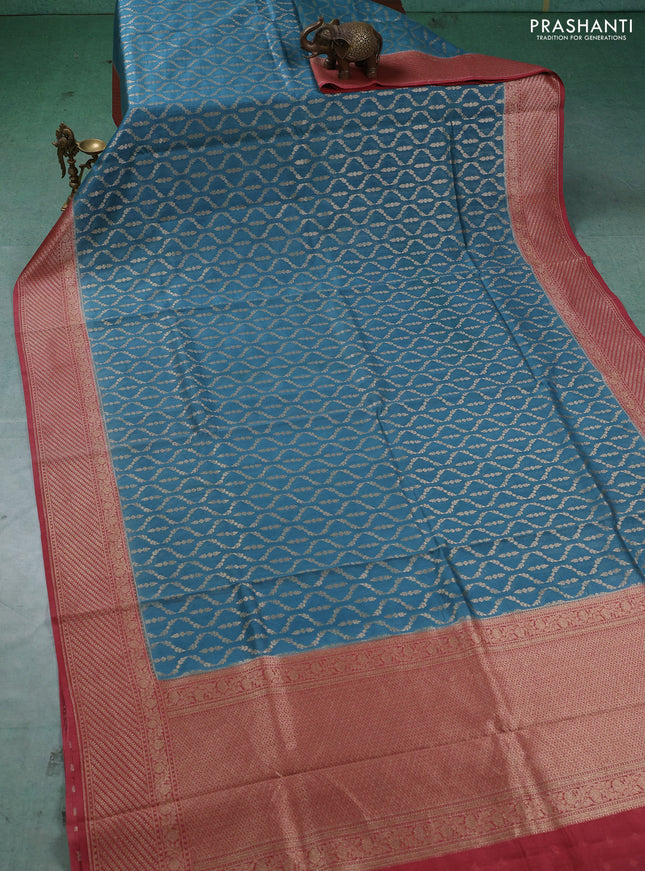 Banarasi silk cotton saree pastel blue and dark peach with allover thread & zari weaves and woven border