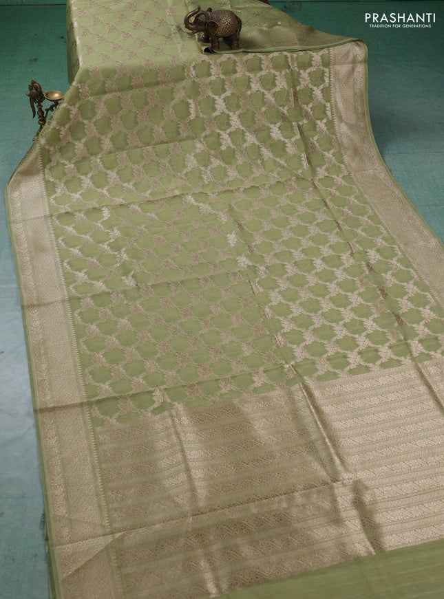 Banarasi silk cotton saree pastel green with allover thread & zari weaves and woven border