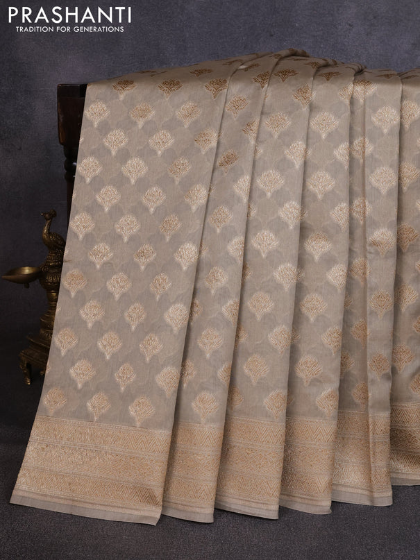 Banarasi silk cotton saree beige with allover thread & zari woven buttas and woven border
