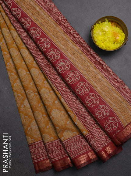 Semi maheshwari cotton saree mustard yellow and maroon with allover floral prints and zari woven border