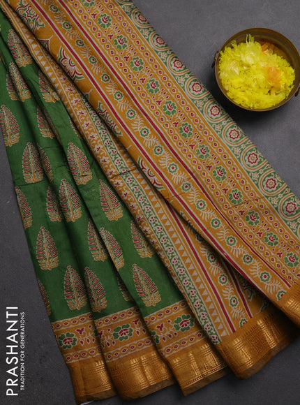 Semi maheshwari cotton saree green and mustard yellow with allover butta prints and zari woven border