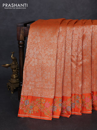 Banarasi silk saree orange with allover brocade weaves and mina border