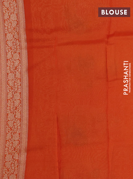 Banarasi silk saree orange with allover brocade weaves and mina border