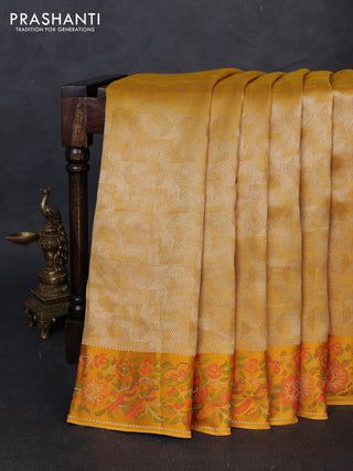 Banarasi silk saree mustard yellow with allover brocade weaves and mina border