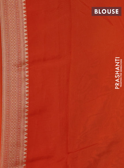 Banarasi silk saree orange with allover brocade weaves and mina border