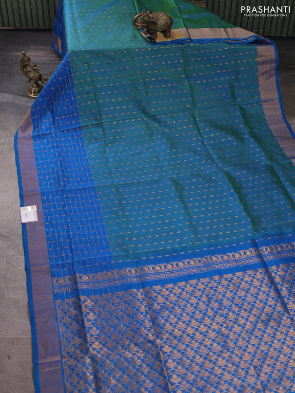 Pure uppada silk saree dual shade of teal bluish green and cs blue with allover zari woven buttas and long zari woven border