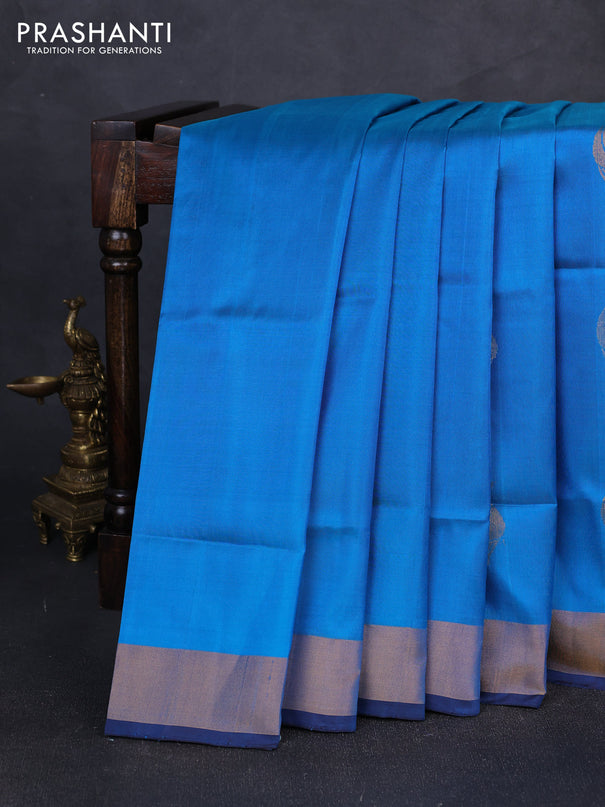 Pure uppada silk saree cs blue and coffee brown with silver & gold zari woven buttas and zari woven border