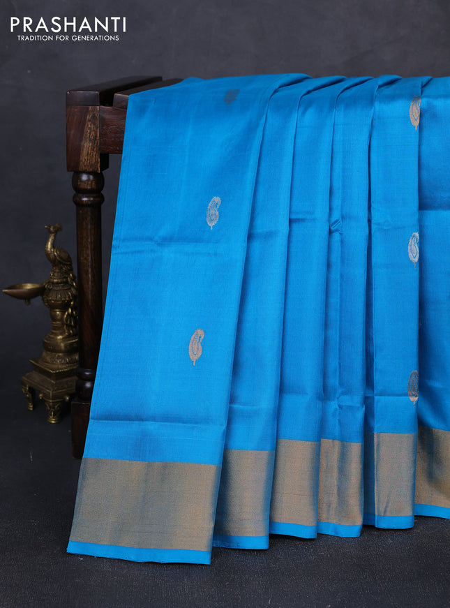 Pure uppada silk saree light blue with silver & gold zari woven paisley buttas and zari woven border