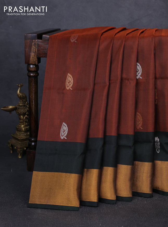 Pure uppada silk saree rust shade and bottle green with silver & gold zari woven buttas and zari woven border