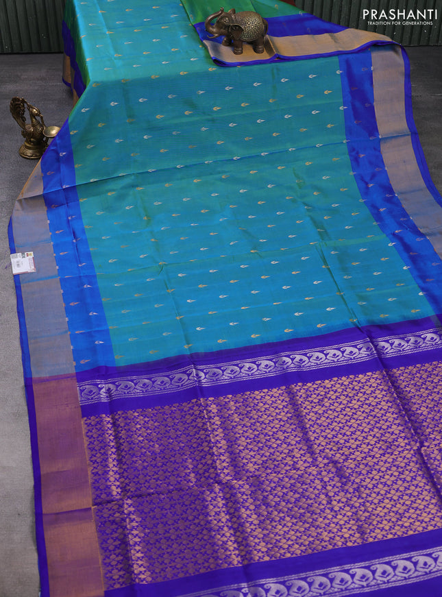 Pure uppada silk saree dual shade of teal bluish green and blue with silver & gold zari woven buttas and zari woven border