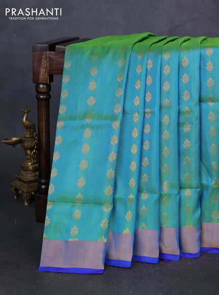 Pure uppada silk saree dual shade of teal bluish green and blue with allover zari woven buttas and zari woven border