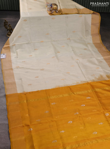 Pure uppada silk saree cream with silver & gold zari woven buttas and zari woven border