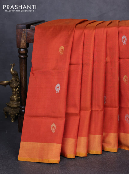 Pure uppada silk saree dual shade of rust and mustard yellow with silver & gold zari woven buttas and zari woven border