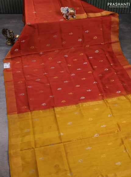 Pure uppada silk saree dual shade of rust and mustard yellow with silver & gold zari woven buttas and zari woven border