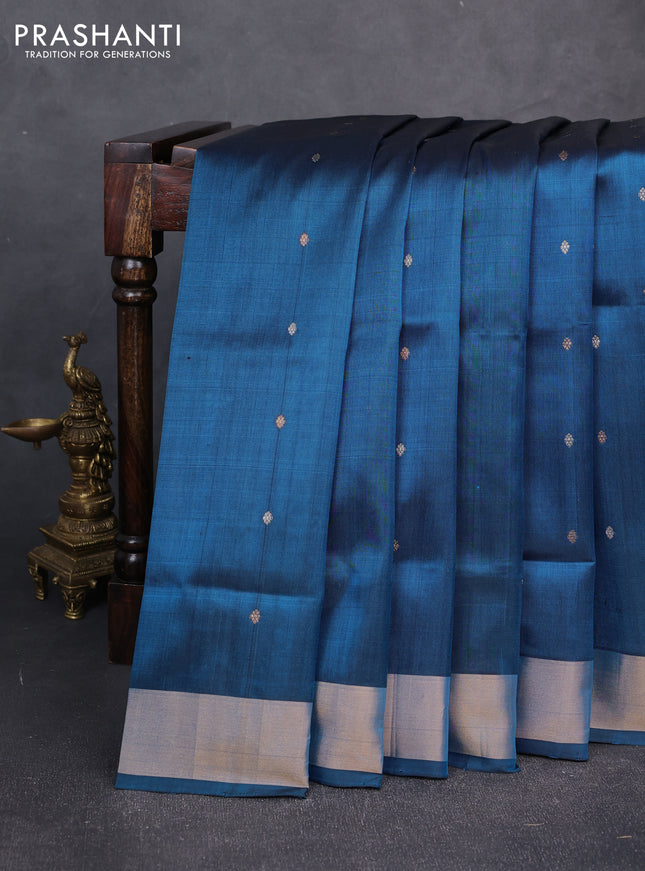 Pure uppada silk saree peacock blue with allover silver & gold zari woven buttas and zari woven border