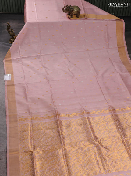 Pure uppada silk saree pastel peach with allover silver & gold zari woven buttas and zari woven border