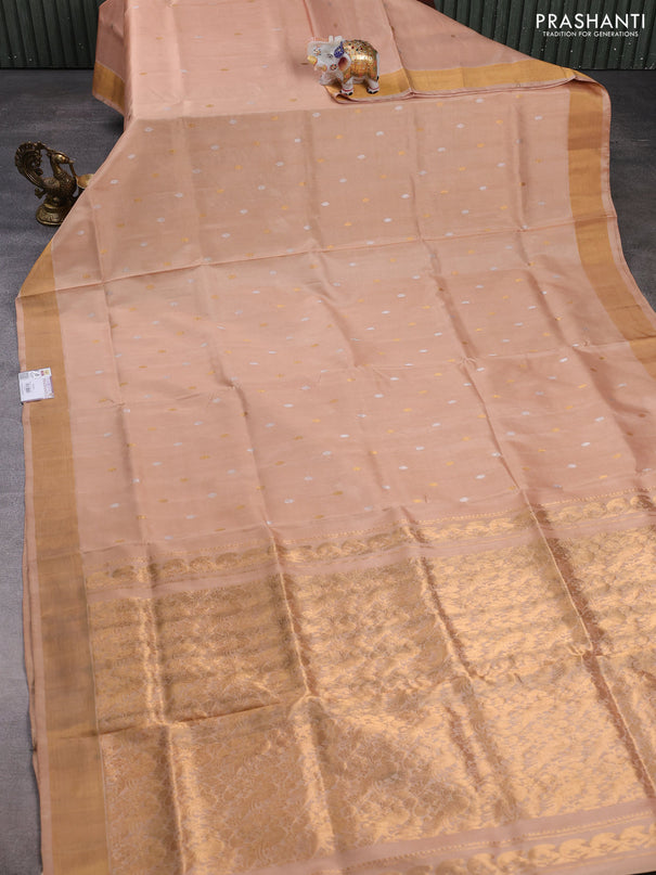 Pure uppada silk saree beige with allover silver & gold zari woven buttas and zari woven border
