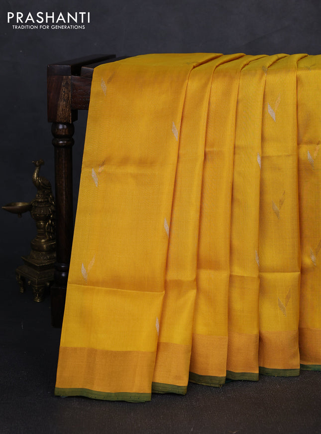 Pure uppada silk saree yellow and bottle green with silver & gold zari woven buttas and zari woven border