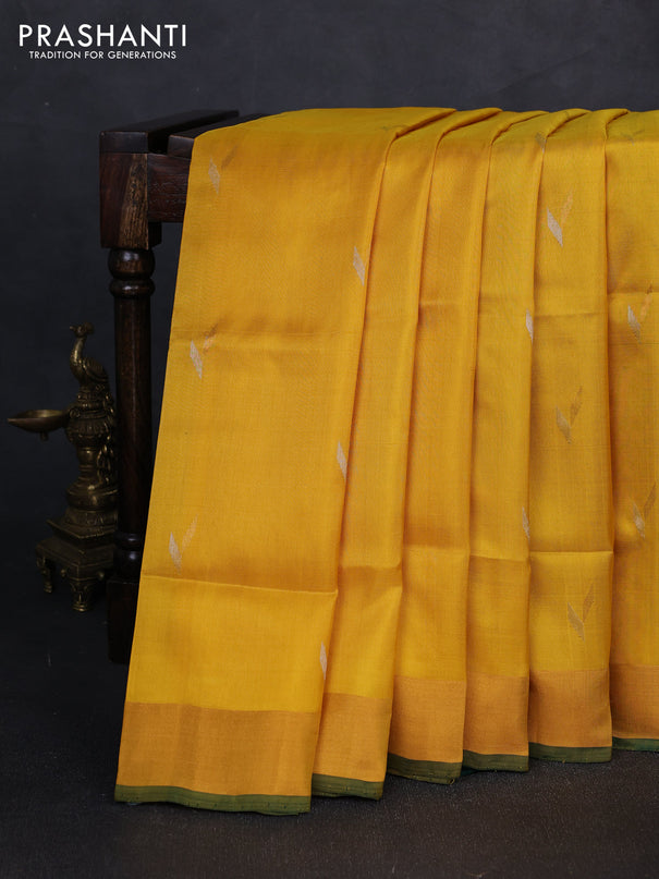 Pure uppada silk saree yellow and bottle green with silver & gold zari woven buttas and zari woven border