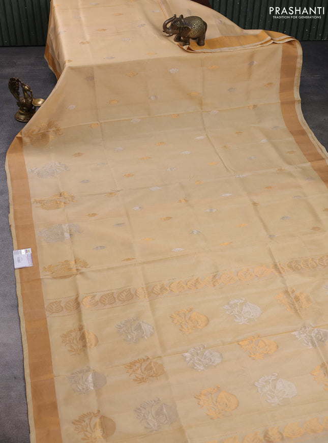Pure uppada silk saree cream with silver & gold zari woven buttas and zari woven butta border