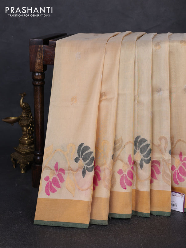 Pure uppada silk saree cream and bottle green with silver & gold zari woven leaf buttas and floral design zari woven border