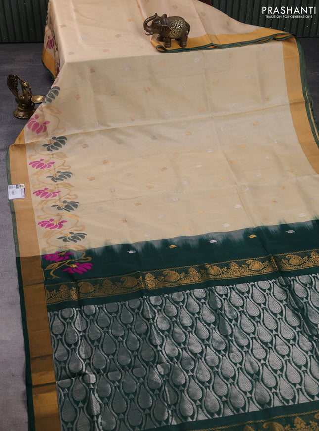 Pure uppada silk saree cream and bottle green with silver & gold zari woven leaf buttas and floral design zari woven border