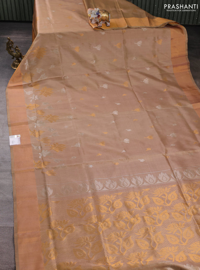 Pure uppada silk saree beige with silver & gold zari woven floral buttas and floral design zari woven border