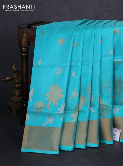 Pure uppada silk saree teal blue with silver & gold zari woven floral buttas and floral design zari woven border