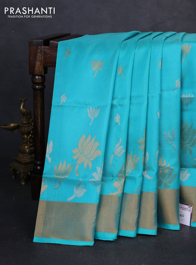 Pure uppada silk saree teal blue with silver & gold zari woven floral buttas and floral design zari woven border
